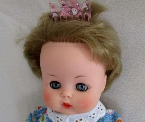 VINTAGE 28CM TALL DOLL MARKED 'SAD' ON BACK