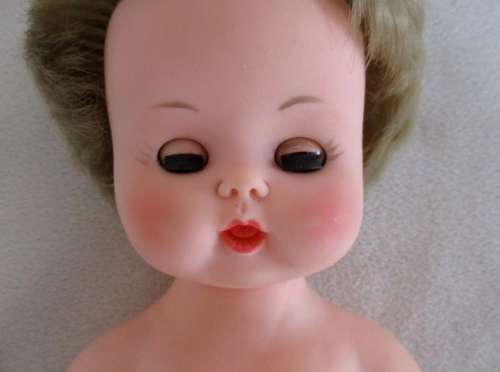 VINTAGE 28CM TALL DOLL MARKED 'SAD' ON BACK