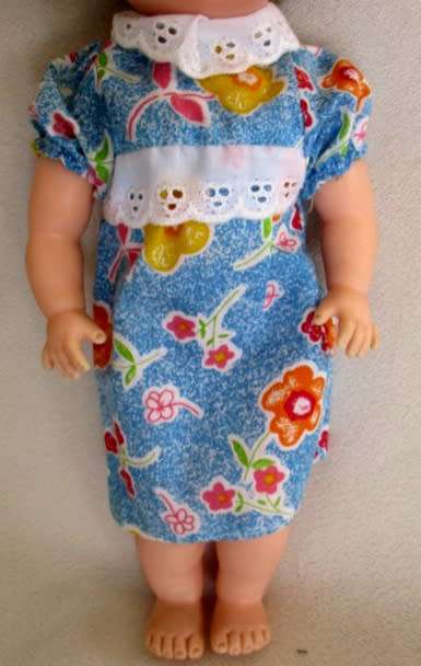 VINTAGE 28CM TALL DOLL MARKED 'SAD' ON BACK