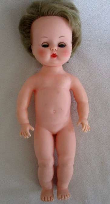 VINTAGE 28CM TALL DOLL MARKED 'SAD' ON BACK