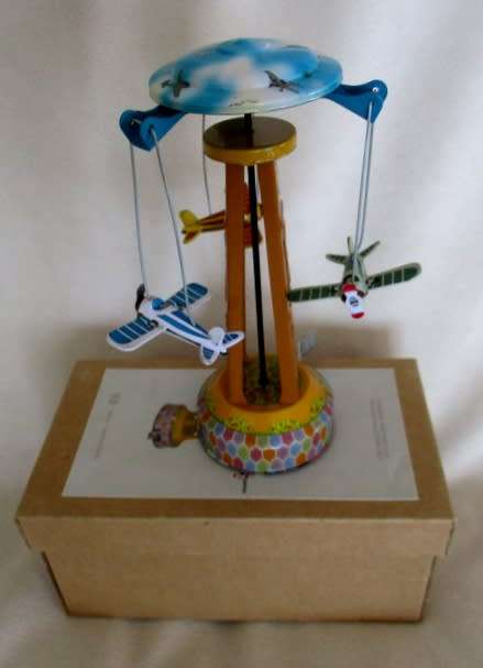 COLLECTABLE RETRO TOYCOMET WIND-UP/LEVER TIN AIRPLANE CAROUSEL WITH BOX