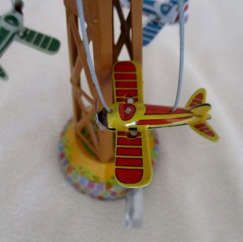 COLLECTABLE RETRO TOYCOMET WIND-UP/LEVER TIN AIRPLANE CAROUSEL WITH BOX
