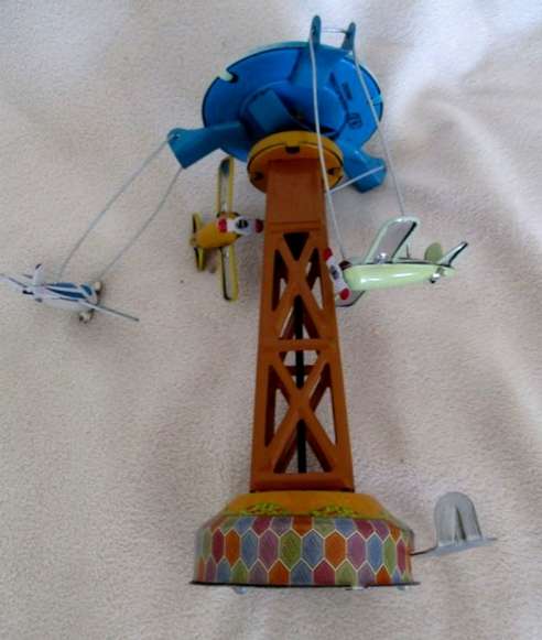 COLLECTABLE RETRO TOYCOMET WIND-UP/LEVER TIN AIRPLANE CAROUSEL WITH BOX