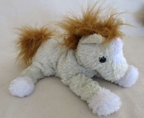 A GROUP OF SEVEN COLLECTABLE PLUSH PONIES (NICI, HAPPY HORSE ETC) TO THRILL A LITTLE GIRL!