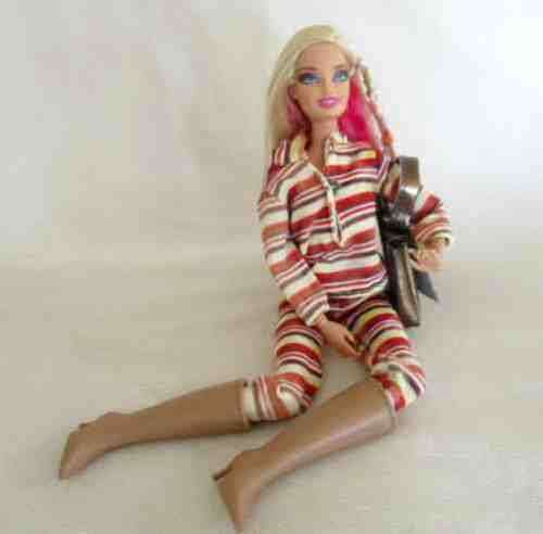 MATTEL BARBIE DOLL WITH ARTICULATED WRISTS, ELBOWS AND KNEES AND BEAUTIFUL PINK HIGHLIGHTS IN HAIR