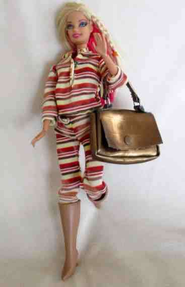 MATTEL BARBIE DOLL WITH ARTICULATED WRISTS, ELBOWS AND KNEES AND BEAUTIFUL PINK HIGHLIGHTS IN HAIR