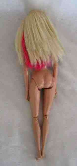 MATTEL BARBIE DOLL WITH ARTICULATED WRISTS, ELBOWS AND KNEES AND BEAUTIFUL PINK HIGHLIGHTS IN HAIR