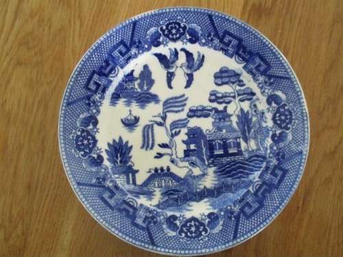 FOUR DIFFERENT-SIZED BLUE AND WHITE WILLOW PATTERN PLATES (TWO MARKED JAPAN) - NICE DISPLAY!