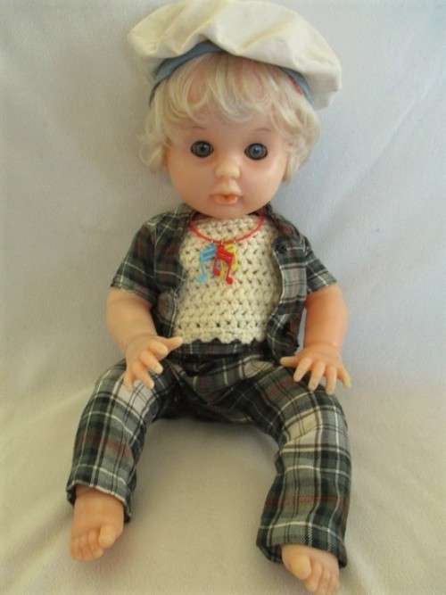 A VINTAGE 44CM TALL FIRST LOVE DOLL WITH TWISTY BODY