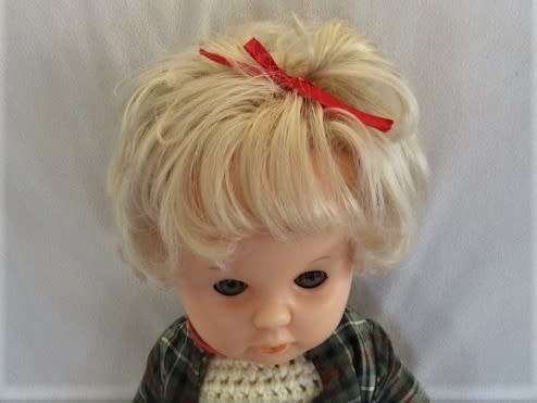 A VINTAGE 44CM TALL FIRST LOVE DOLL WITH TWISTY BODY