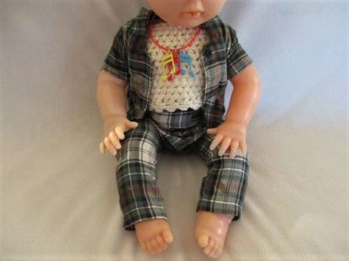 A VINTAGE 44CM TALL FIRST LOVE DOLL WITH TWISTY BODY