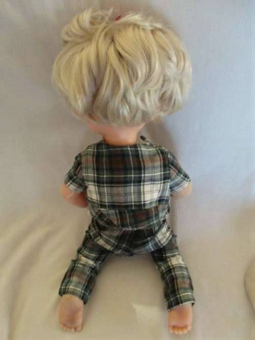 A VINTAGE 44CM TALL FIRST LOVE DOLL WITH TWISTY BODY