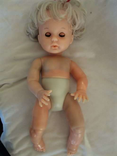 A VINTAGE 44CM TALL FIRST LOVE DOLL WITH TWISTY BODY