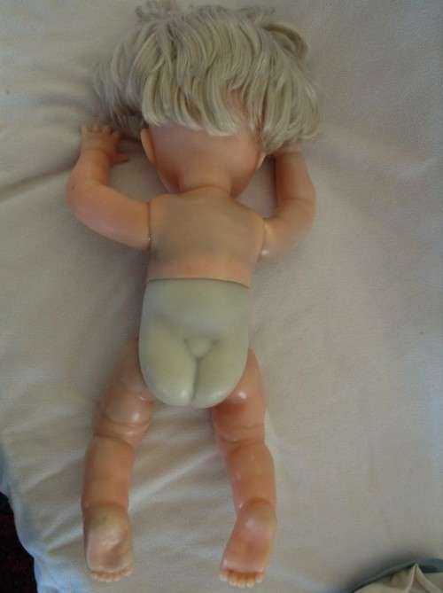 A VINTAGE 44CM TALL FIRST LOVE DOLL WITH TWISTY BODY