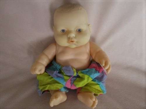 A RATHER DIFFERENT SMALL CHUBBY BABY DOLL