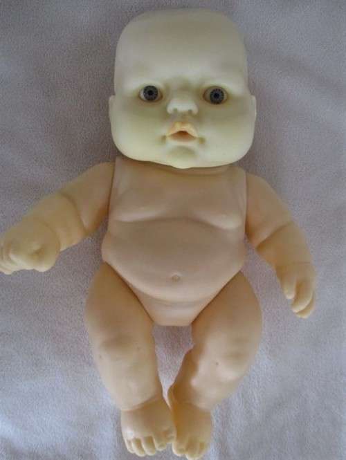 A RATHER DIFFERENT SMALL CHUBBY BABY DOLL