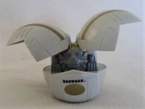A BAKUGAN BALL FIGURE WITH WIND-UP MECHANISM TO OPEN UP