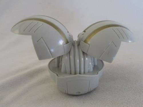 A BAKUGAN BALL FIGURE WITH WIND-UP MECHANISM TO OPEN UP