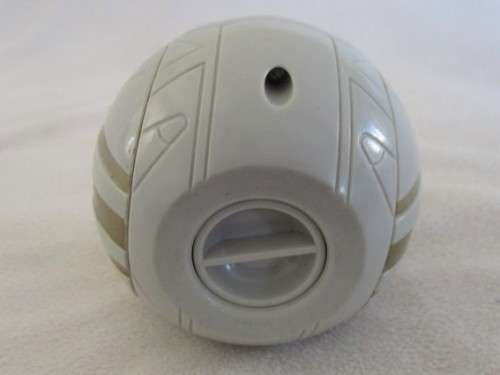 A BAKUGAN BALL FIGURE WITH WIND-UP MECHANISM TO OPEN UP