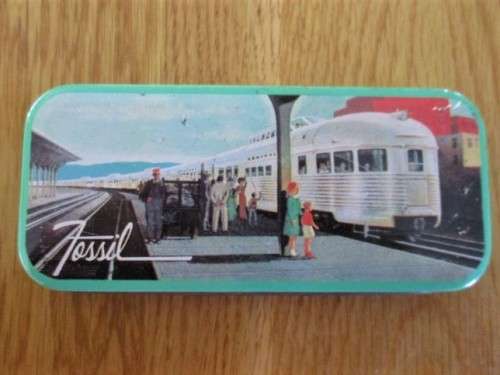 A COLLECTABLE 1991 FOSSIL WATCH TIN