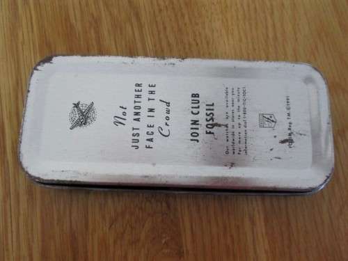 A COLLECTABLE 1991 FOSSIL WATCH TIN