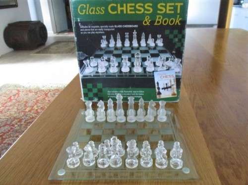 A COMPLETE GLASS CHESS SET WITH ORIGINAL BOX
