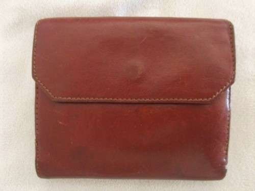 A VINTAGE REAL CALF LEATHER WALLET