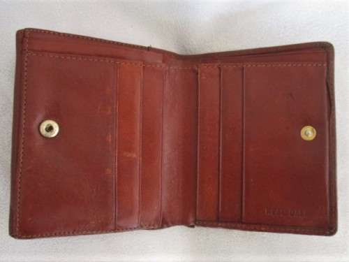 A VINTAGE REAL CALF LEATHER WALLET