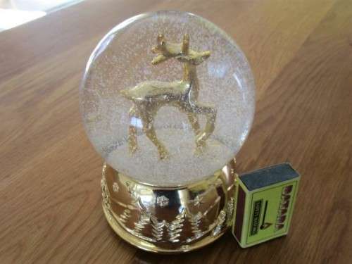 CHRISTMAS IS COMING - A LARGE CONTEMPEMPORARY MUSICAL GLASS SNOW GLOBE - 'WE WISH YOU A MERRY XMAS'