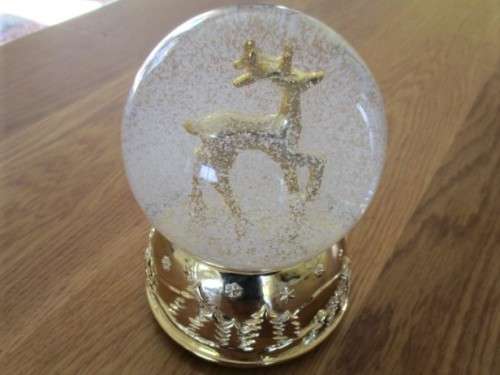 CHRISTMAS IS COMING - A LARGE CONTEMPEMPORARY MUSICAL GLASS SNOW GLOBE - 'WE WISH YOU A MERRY XMAS'