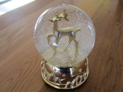 CHRISTMAS IS COMING - A LARGE CONTEMPEMPORARY MUSICAL GLASS SNOW GLOBE - 'WE WISH YOU A MERRY XMAS'