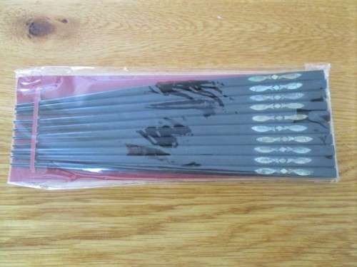 FIVE PAIRS OF BEAUTIFUL CHOPSTICKS WITH MOTHER OF PEARL DETAIL - STILL SEALED