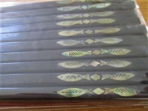 FIVE PAIRS OF BEAUTIFUL CHOPSTICKS WITH MOTHER OF PEARL DETAIL - STILL SEALED
