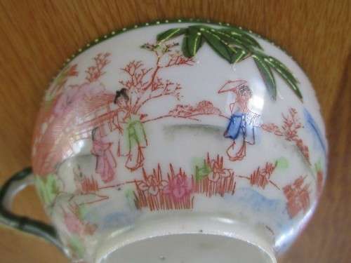 DELICATE, VINTAGE JAPANESE CUP AND SAUCER