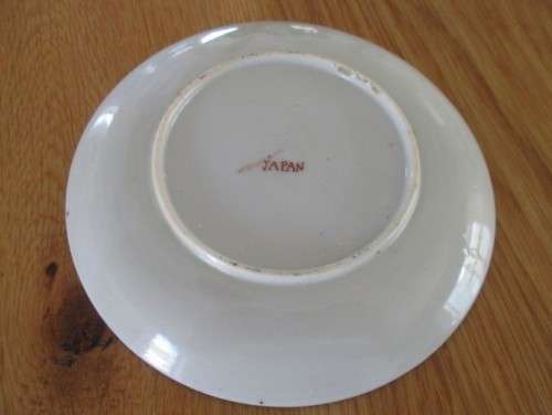 DELICATE, VINTAGE JAPANESE CUP AND SAUCER