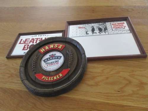 TWO BAR MIRRORS AND A HANSA SIGN