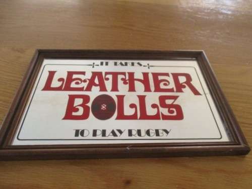 TWO BAR MIRRORS AND A HANSA SIGN