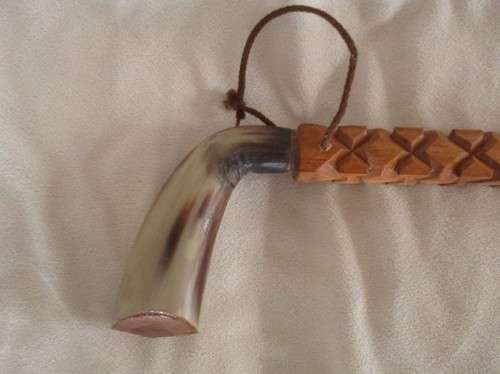 A VINTAGE ORNATELY CARVED, BONE HANDLED WOODEN WALKING STICK