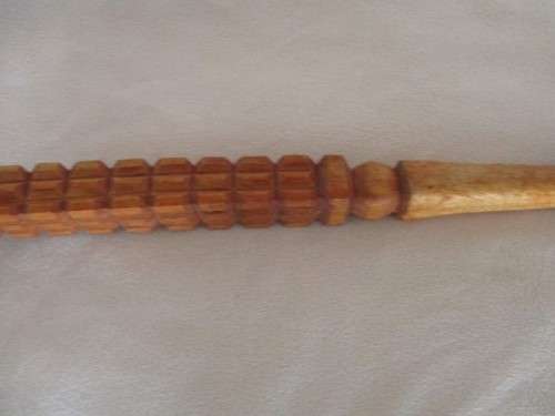 A VINTAGE ORNATELY CARVED, BONE HANDLED WOODEN WALKING STICK