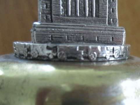 AN OLD BELL WITH DETAILED VOORTREKKER MONUMENT TO ADD TO YOUR AFRICANA COLLECTION