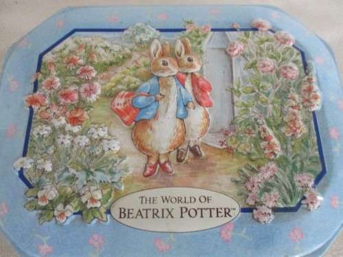 A COLLECTABLE BENTLEY'S OF LONDON TIN WITH RAISED RELIEF DESIGN - THE WORLD OF BEATRIX POTTER