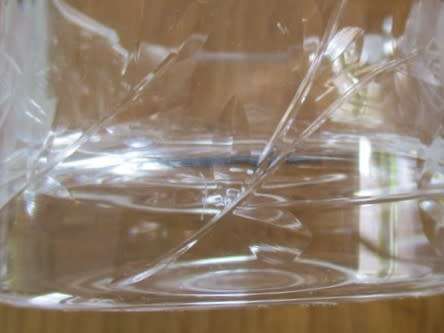 A BEAUTIFULROSECUT GLASS ASHTRAY IN EXCELLENT CONDITION