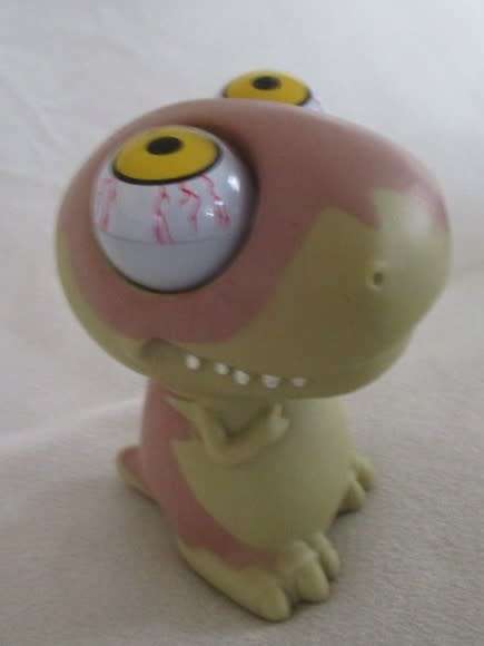 APPARENTLY A `POPPIN PEEPER` STRESS RELIEF BALL - THE WEIRDEST CRAZY, GOOGLY-EYED DINOSAUR I`VE SEEN