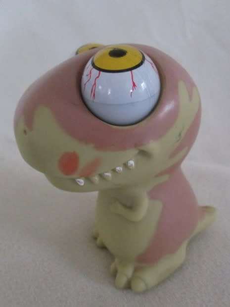 APPARENTLY A `POPPIN PEEPER` STRESS RELIEF BALL - THE WEIRDEST CRAZY, GOOGLY-EYED DINOSAUR I`VE SEEN