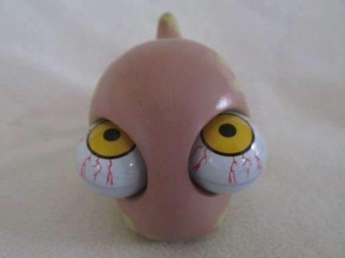APPARENTLY A `POPPIN PEEPER` STRESS RELIEF BALL - THE WEIRDEST CRAZY, GOOGLY-EYED DINOSAUR I`VE SEEN