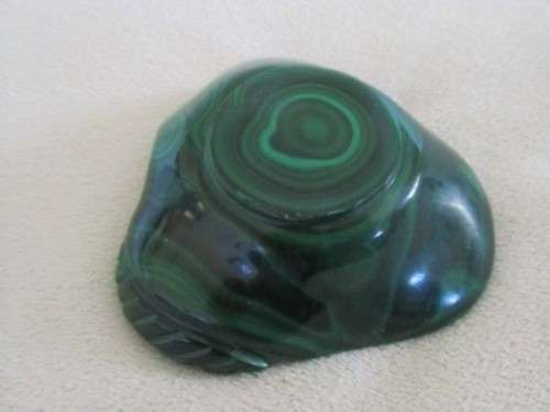 A BEAUTIFUL SMALL MALACHITE EGG IN MALACHITE "NEST"