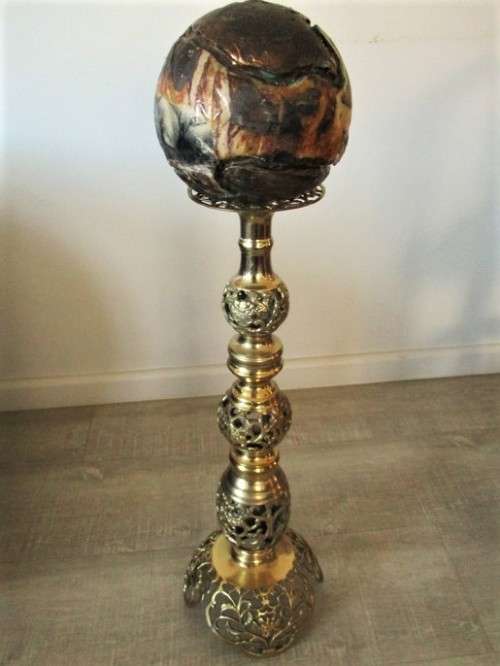 GORGEOUS!! ENORMOUS ORNATE BRASS CANDLE HOLDER WITH CANDLE (COMPARE SIZE TO WINE BOTTLE AND CHAIR)