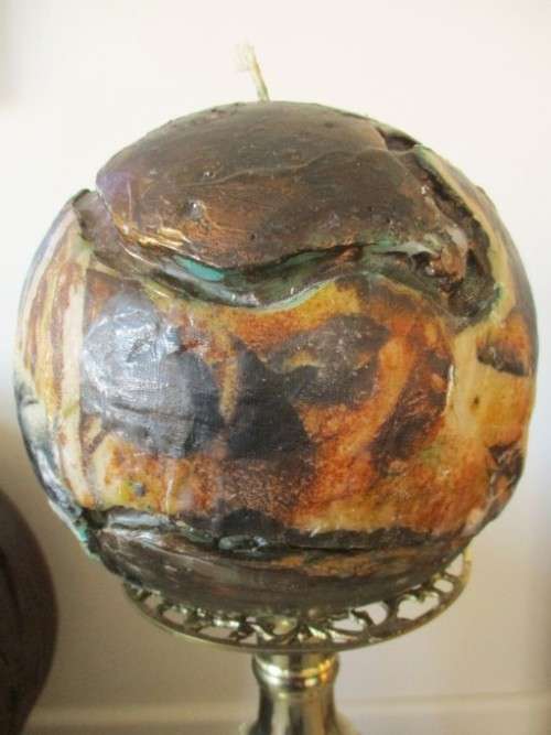 GORGEOUS!! ENORMOUS ORNATE BRASS CANDLE HOLDER WITH CANDLE (COMPARE SIZE TO WINE BOTTLE AND CHAIR)