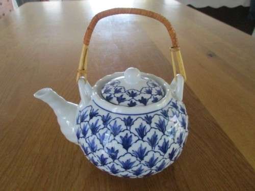BLUE AND WHITE TEAPOT DESIGNED BY SWEDISH DESIGNER, LISA LARSEN