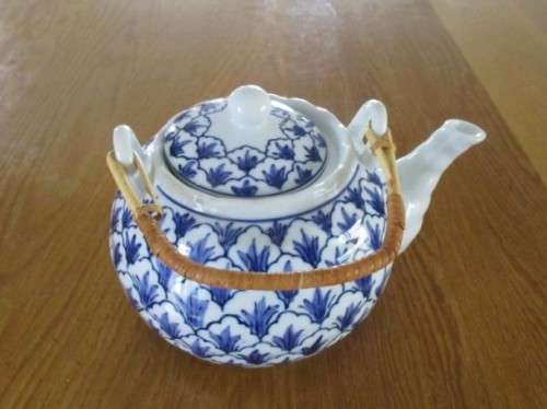 BLUE AND WHITE TEAPOT DESIGNED BY SWEDISH DESIGNER, LISA LARSEN